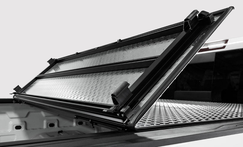 Access LOMAX 2024 Toyota Tacoma 5ft Bed Folding Hard Cover - Black Urethane — Photo - Mounted