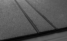 Load image into Gallery viewer, Access LOMAX Tri-Fold Cover Black Urethane Finish 22+ Toyota Tundra - 5ft 6in Bed — Photo - Mounted