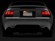 Load image into Gallery viewer, Raxiom 99-04 Ford Mustang Excluding 99-01 Cobra Tail Lights- Black Housing (Smoked Lens)